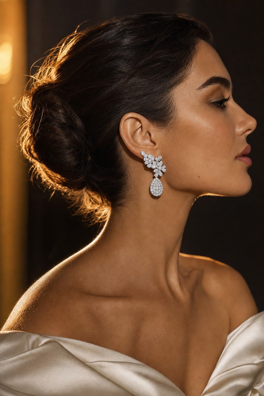 Diamond drop earrings in profile
