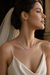 Bride wearing a diamond rivière necklace