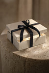 Maison ÉLAN gift box with black ribbon