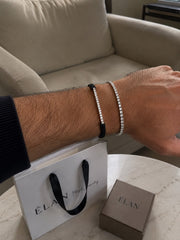 Diamond Bar Cord Bracelet stacked with a diamond tennis bracelet