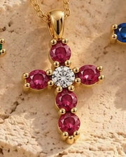 The Faith Cross in ruby and 14K yellow gold
